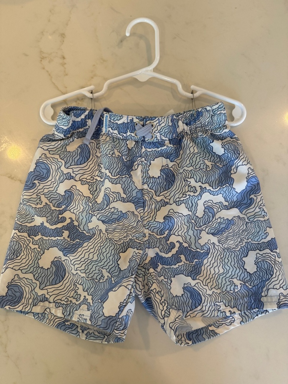 Kids Blue Wave-Print Swim Trunks